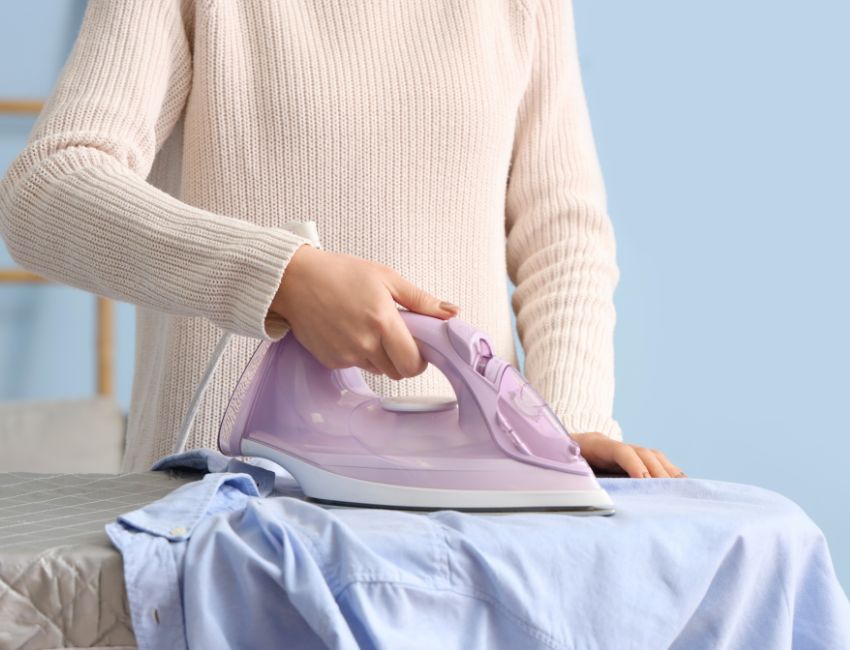 expert steam press for perfectly finished garments - Grand Power Cleaners